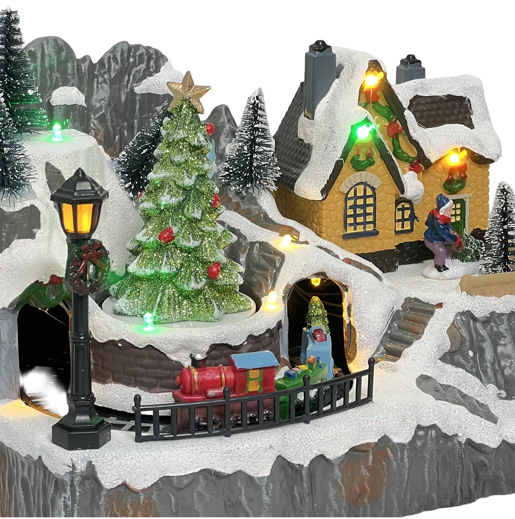 Casa navidad con luz y sonido 23cm patines